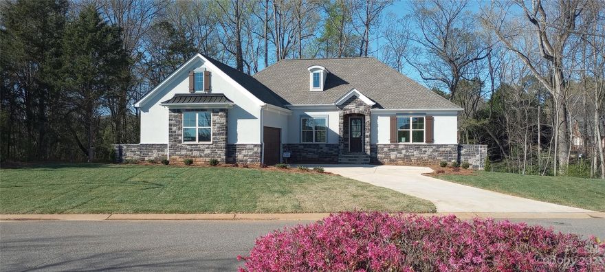 This is a rare opportunity to own a beautiful new home in the desirable Meadow Lakes II neighborhood. Enjoy a peaceful lifestyle surrounded by fantastic community lakes, clubhouse, and recreational amenities. Focused on main story living this open floor plan has everything needed for a luxurious multigenerational accessible lifestyle. Entertain in the combined living-dining-kitchen spaces overflowing into the outdoor living room and grilling deck. End your day in the relaxing owner's suite and bath including a huge walk-in closet. A second bedroom wing includes two bedrooms and baths. The lower level with its high ceilings has two additional bedrooms, full bath and huge media/rec room and direct access to a covered lower patio.  Relaxing, entertaining or enjoying a leisurely stroll, this home and community has everything you need for generations to come.