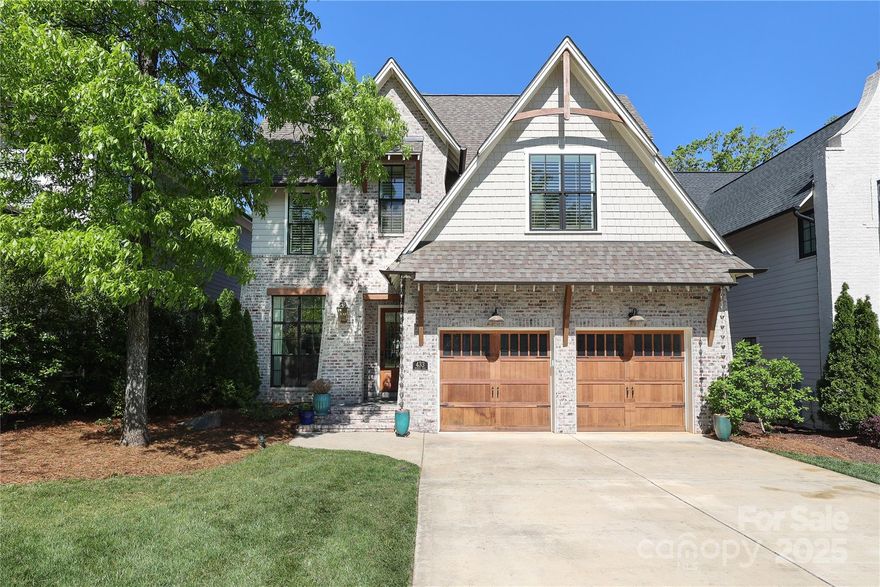 Welcome to this beautifully crafted home by Pike Properties, nestled in the heart of desirable Cotswold. Built in 2020, this thoughtfully designed residence offers 4,366 square feet of elegant living space with a flowing floor plan ideal for both everyday living and entertaining. The home features generous living and dining areas, a stunning chef’s kitchen, and a versatile main-level office alongside a guest bedroom with a full bath. Wonderful drop zone, utility room and built in desk area off garage. Upstairs, you’ll find four additional spacious bedrooms and bonus room. Step outside to enjoy a wonderful screened porch and outdoor kitchen overlooking the fenced backyard—perfect for relaxing or hosting friends. Conveniently located just minutes from Uptown, SouthPark, Plaza Midwood, and the shops and dining at Cotswold Village, this home blends modern comfort with unbeatable accessibility.