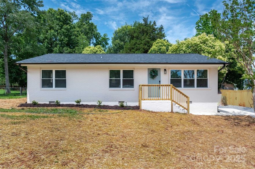 Welcome to 756 Logan Street! This is a beautifully updated brick ranch located just minutes from Downtown Mooresville! This fully renovated house features a new roof, HVAC, windows, doors, plumbing, electrical, flooring, kitchen, bathrooms, back deck, and in-ground pool! Inside, enjoy an open, light-filled layout with luxury vinyl plank flooring, a modern kitchen with granite countertops and stainless-steel appliances, and updated bathrooms with fresh tile and fixtures. Step outside to a fully fenced backyard with a large in-ground pool—ideal for relaxing, entertaining, or unwinding after a long day. Located in a quiet, established neighborhood with easy access to shopping, dining, schools, and I-77. Showings available on 6/12!