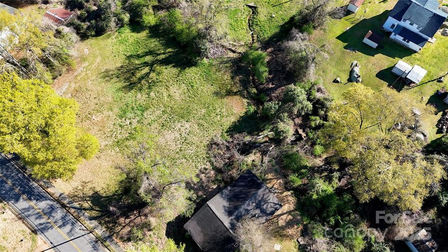 Imagine your custom home on this .60-acre parcel, fully ready to build — city water and utilities are already available. Nestled in small-town Great Falls, it’s a gateway to outdoor adventure: right nearby, Duke Energy’s whitewater recreation area offers kayaking, canoeing, and fishing on the Catawba River.