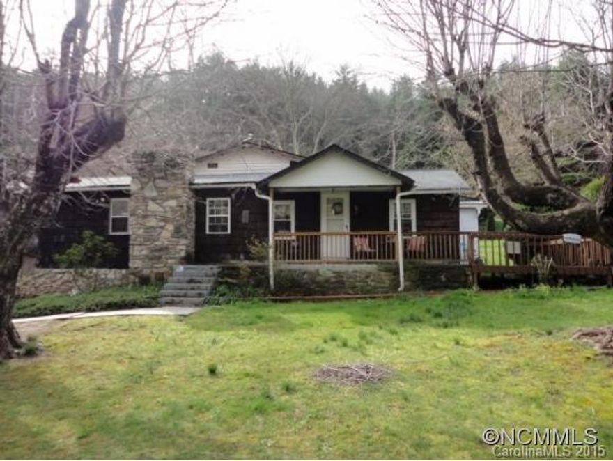 Farmhouse w/peaceful mountain views. Rural setting, close to creeks, hiking, shopping, Hwy 70, I-40, Warren Wilson college, and ACA. Living room has large stone fireplace. Recent remodel: new kitchen, laundry room, library, tile and wood-look laminate flooring. Private master w/access to back patio. Beautiful 0.5 acre, mostly level, w/grapevines, pear, and cherry trees. Oversized 900 SF double garage w/power & additional workshop space.