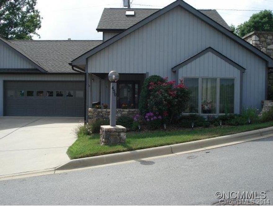 Wonderful 2 bedroom, 2 bath, home almost in downtown Weaverville offers privacy not usually found in a townhome. Quality workmanship throughout with tile, hardwood floors and carpet in the bedrooms. Kitchen accented with granite counters. Oak stairs with skylight. Vaulted ceilings in living area with fireplace. Loft area could be library, office or guest space. Walkable community near downtown and Lake Louise.