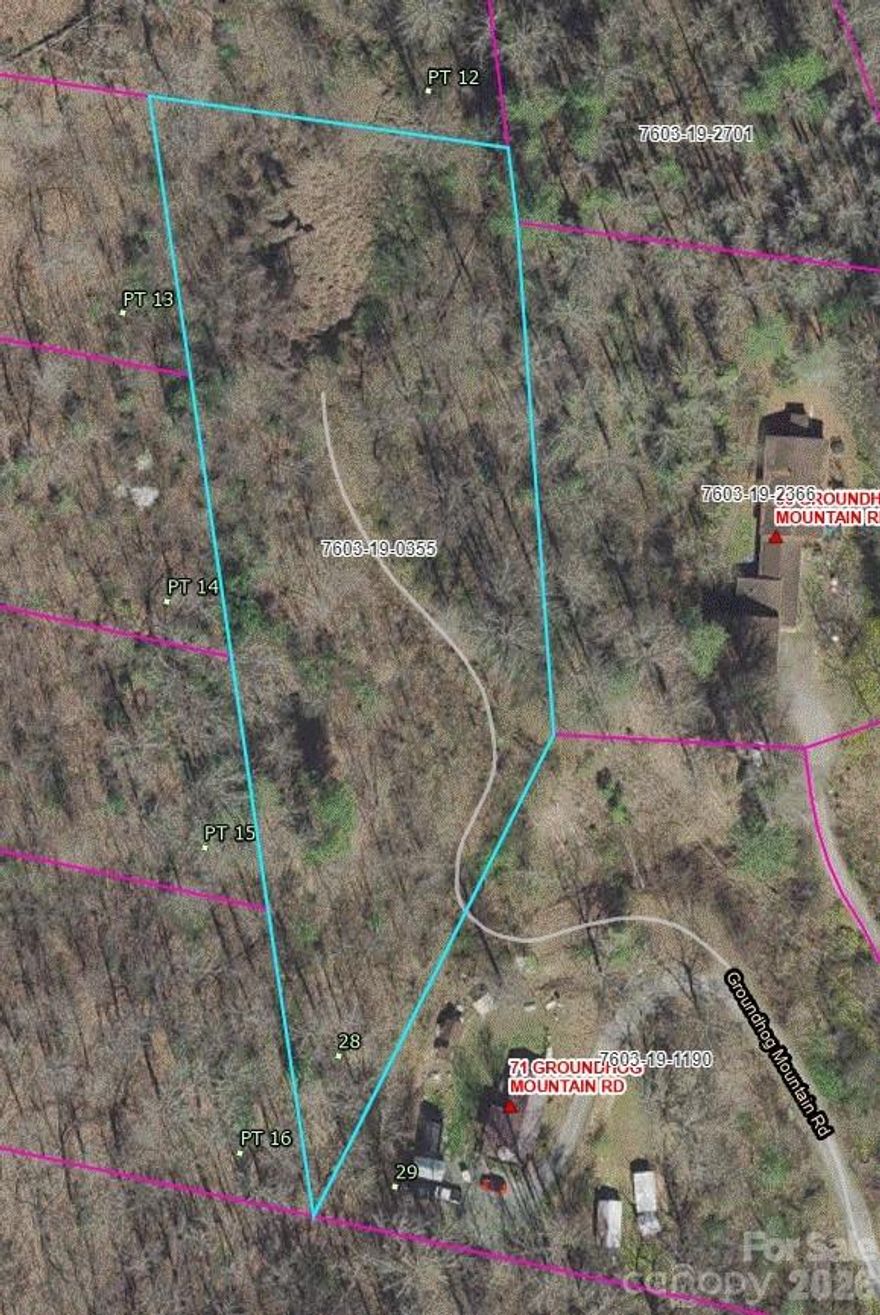 Tucked away off Groundhog Mountain Road - 1.76 acres+/- ready to be build your mountain getaway home!