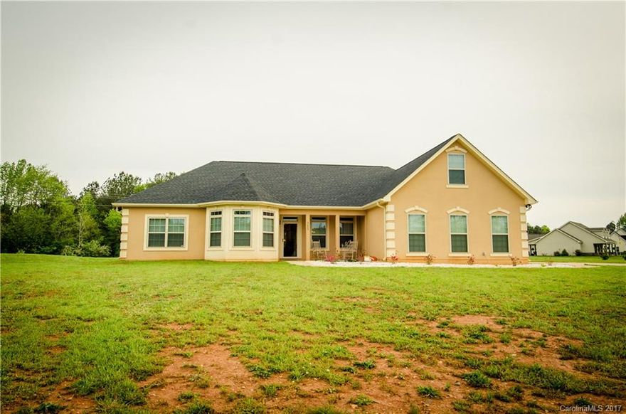 Welcome Home!  Beautiful split level 3 bedroom 2.5 bath with a spacious bonus room.  This Beauty features formal dining and living areas, 3 car garage  and tons of other Great features.  Outback Patio is perfect for relaxing or entertaining your guest.  Truly a must See! Motivated Sellers!!  Call and Schedule your appointment today!  This property qualifies for 100% No Money Down Financing with USDA.