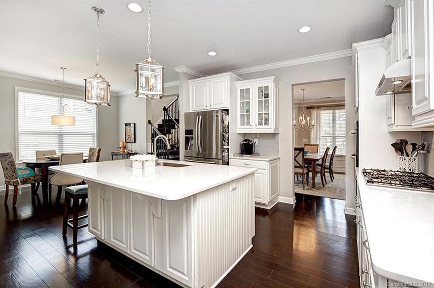 Breathtaking, to say the least!! Stunning and turn key, this home is poised to please! You'll be impressed w/the gourmet kitchen, master on main, 5" Harwood floors, rear screened porch/patio, and the other countless upgrades. This home has been meticulously maintained! Centrally located in the Shelly Woods neighborhood & backs up to the tree line. The community features pool and playground for all to enjoy!