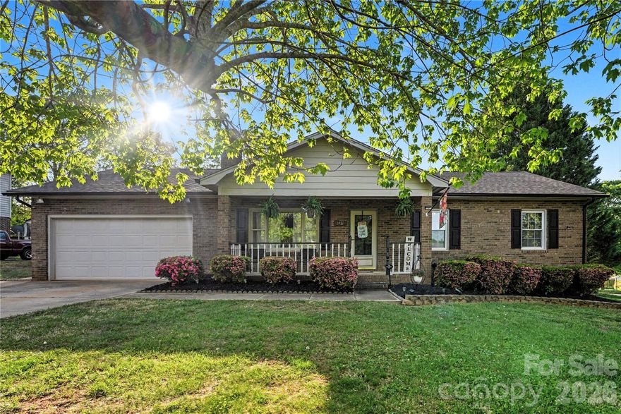 Step into this Inviting All-Brick Ranch in a Desirable area of Conover — Relaxing and Spacious Entertaining Area featuring a large level, fenced-in yard with a spacious deck, above-ground pool, multiple cozy seating areas and a convenient storage building — perfect for summer parties, weekend barbecues, or quiet evenings by the pool. Inside, discover 3 bedrooms and 2 full baths with granite countertops, a warm living room with a brick fireplace, and an open kitchen and dining area. Enjoy the covered front patio, double attached garage with extra storage, and the freedom of no HOA dues. Move right in and start making those summer memories.