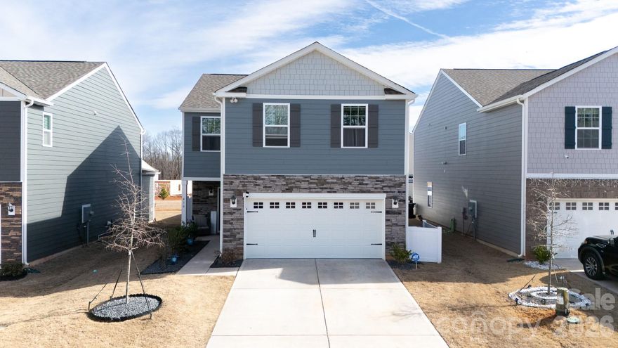 Forget the wait of building; this 2024-built home in Fergus Crossing delivers a modern, open-concept lifestyle from day one. The heart of the home is a bright kitchen featuring a central island and pantry, flowing naturally into the living room, showcasing a fireplace! The primary suite serves as a true getaway with a walk-in closet, garden tub, and separate shower. Beyond the interior, the heated and cooled garage with an insulated door serves as a versatile extension of your living space—perfect for a home gym, workshop, or hobby den. Spend your afternoons enjoying the privacy-fenced backyard or take advantage of the amenity-rich community, where pickleball courts, a pool, and walking trails are waiting for you.
