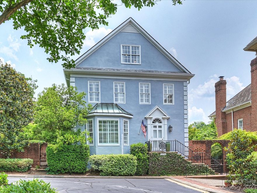 What a location!  This Charleston-styled home (in gated Whitehall) is located in the very heart of Myers Park, a few blocks from Freedom Park/Sugar Creek Greenway, and only a short drive from uptown Charlotte.  Beautifully updated throughout, the kitchen-living-dining areas showcase stunning site-finished oak floors, with main level flowing (via French doorways) to a massive, private terrace, blessed w/ mature landscaping and water feature.  Primary Suite has a large bathroom (recently renovated) with distinct brick flooring and spa-shower, plus walk-in closet.  Second Flr also includes secondary bedroom with private bathroom and additional family/den.  Third floor sports two bedrooms (w/bath) plus huge walk-in storage.  Lower level has a 2-car, custom garage, another full bath, and 680 HLA of finished "flex-space" (now used as music studio, upfitted with special sound insulation).  Low-maintenance, city-life in a lovely, gated community w/security guard, just minutes from uptown!