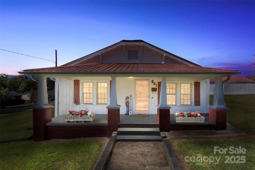 A Rare Gem in the Heart of Bessemer City is Back on the Market! Full inspection report and list of repairs performed are available upon request. 
 
This beautifully restored two-bedroom, two-bath Craftsman-style home with a large flex space is a true treasure. Rarely will you find a property that so perfectly combines historic charm with modern comfort. Nestled on a spacious corner lot in one of Bessemer City’s most beloved neighborhoods, this home has been lovingly revitalized with great care and devotion — preserving its soul while bringing it gracefully into the present.

Inviting front and rear porches welcome you to slow down and savor the moment — whether you’re sipping coffee while greeting neighbors, enjoying a lively chat with friends, or watching the little ones play as the world passes by. Inside, every detail reflects quality craftsmanship and pride of ownership.

All major updates have been thoughtfully completed, including new HVAC, new water heater, new appliances, and updated flooring, ensuring comfort and peace of mind for years to come.

The detached workshop and garage offers abundant storage for a master craftsman, skilled mechanic, or creative hobbyist with exciting potential for a future guest suite or studio space. The flex room, complete with a closet, offers endless possibilities — use it as an office, hobby room, nursery, or even transform it into an incredible primary closet.

If these walls could talk, they’d share stories of joy, laughter, and cherished moments — now ready for you to write the next chapter. This isn’t just a home; it’s a piece of history filled with warmth and love, waiting to be yours.