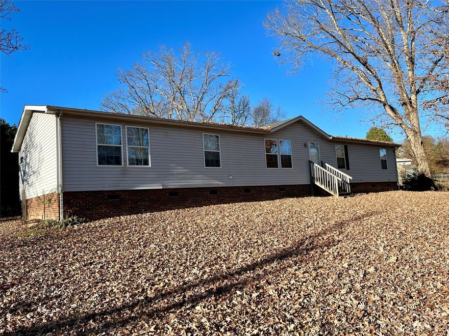 4 bedroom 2 bathroom doublewide with over 2,000sqft. Home needs some TLC.