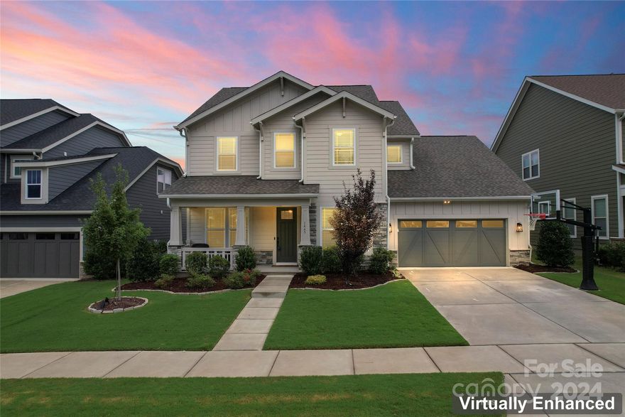 This exquisite Fortuna model by Fielding Homes is filled with upgrades, starting with elegant, upgraded flooring, board and batten accents, upgraded lighting on main level. Designed for hosting, the open floor plan with spacious great room with custom limestone fireplace surround. The designers chef's kitchen with an over-sized waterfall edge island, Calacatta marble with custom drain boards, diamond black quartzite on perimeter counter, full marble backsplash,  large under-mount sink, floor to ceiling cabinets, under cabinet lighting, modern stainless steel appliances, double wall oven, large walk-in pantry, and more! Upstairs is a cozy loft, spacious laundry room, Primary bedroom, 3 additional bedrooms and 3 baths. The primary bath is beautifully tiled, featuring luxurious shower, garden tub, and a large walk-in closet. The backyard is your oasis featuring a screened porch, an expansive patio with a pergola, and a privacy fence for seclusion. A 3-car Tandem garage. Welcome Home!!