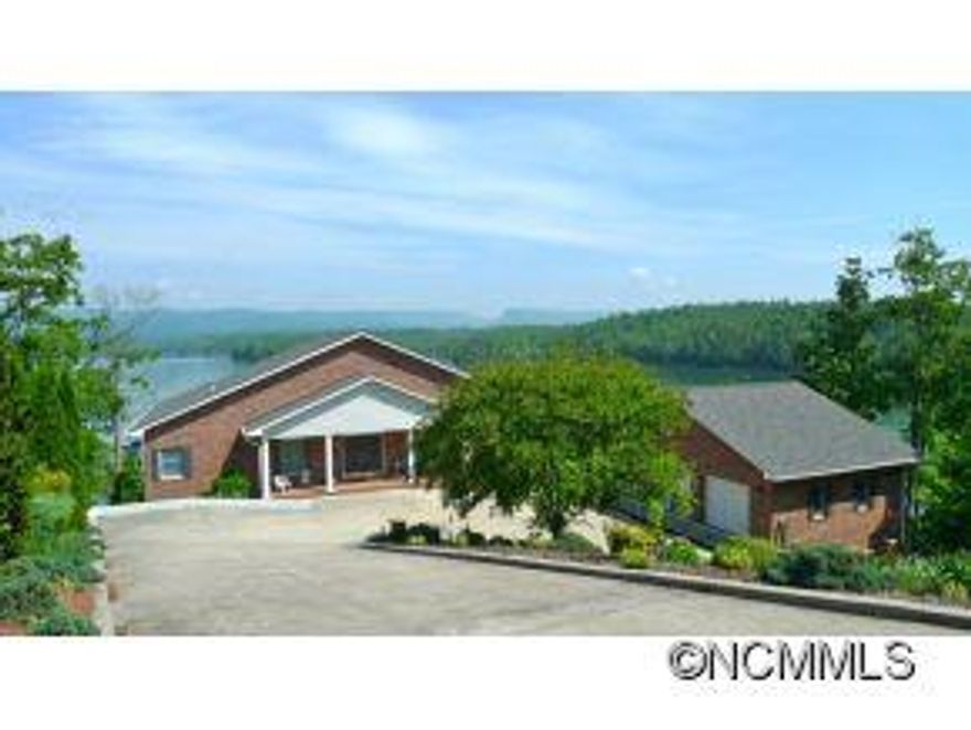 Custom Built in 2001, solid brick exterior with 2x6 construction. Open great room with cathedral ceiling, large bright kitchen island and custom black walnut cabinetry. Mastersuite with sitting area overlooking the lake and access to 28x10 deck. Lower level has fabulous entertaining space with family room, full 2nd kitchen, two guest rooms and two full baths. Anderson windows, recirculating HW pump, H pump and gas furnace, back up HVAC.