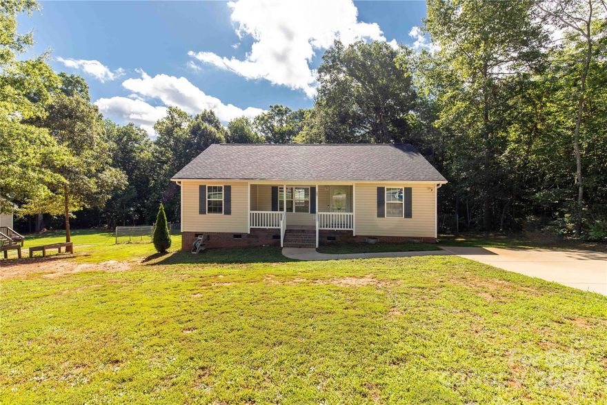 This charming 3 bedroom, 2 bath home has a versatile split floorplan, perfect for anyone! LVT flooring throughout! But the magic truly unfolds outside! Nestled on 1.4 acres in the highly sought after Buford Schools district, this properly offers endless possibilities. Relax on the covered front porch, sipping sweet tea & enjoying the country atmosphere or fire up the grill on the back deck. The fenced backyard is a blank canvas for a fire pit, a pool, a garden, or all of the above. This move in ready home won't last long. Schedule your showing today.