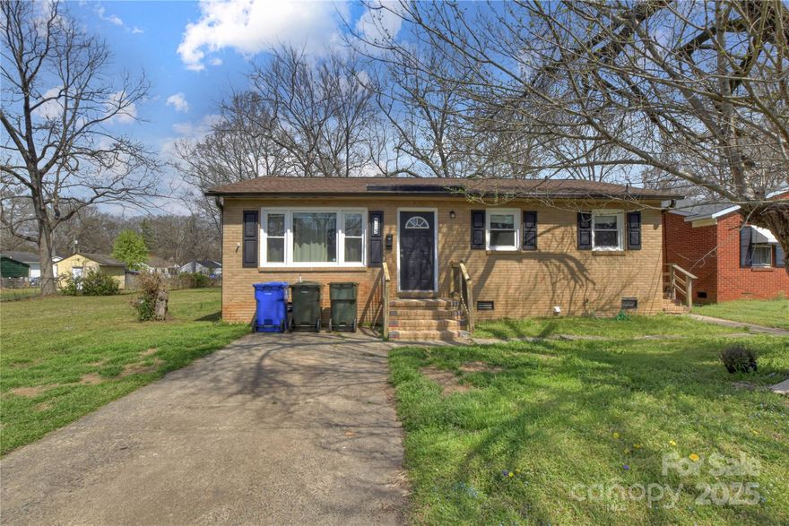 All-brick 3 bedroom home in a great Rock Hill location, just minutes from shopping, dining, and downtown. Beautiful hardwood floors flow through the main living areas with neutral colors throughout. New hot water heater and washer and dryer will convey. Perfect for downsizing or a first-time buyer and ready to make your own!