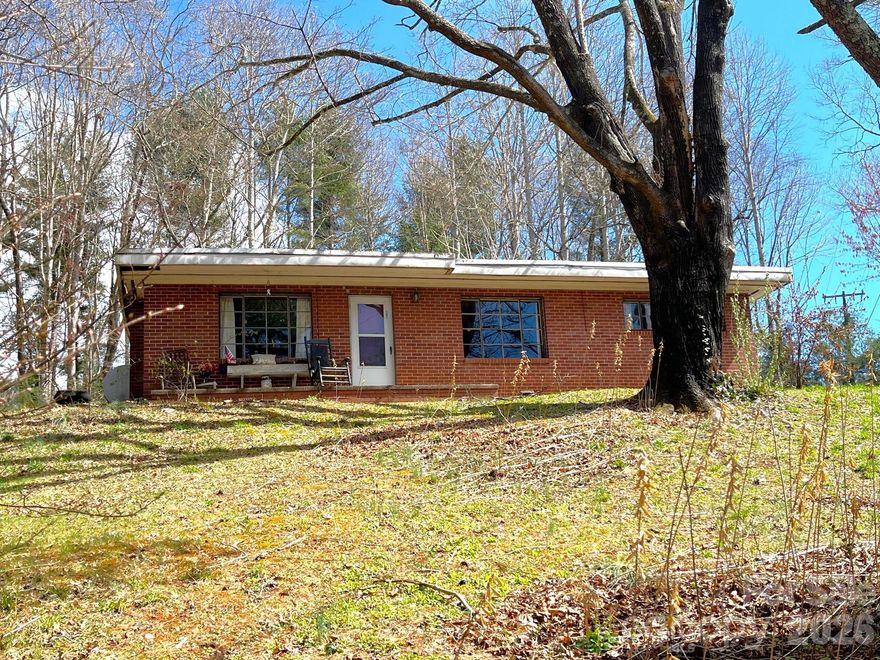 Just across the street from the Ingles in Black Mountain and convenient to I-40, this getaway is ready for your updates. Situated on a lovely 1.07 acre wooded lot, this home has an elevated position with winter views of the surrounding mountains. Great investment opportunity or starter home!
Subject to Court Approval and a 10 day upset period. Sold AS-IS.
Power and water are currently off.