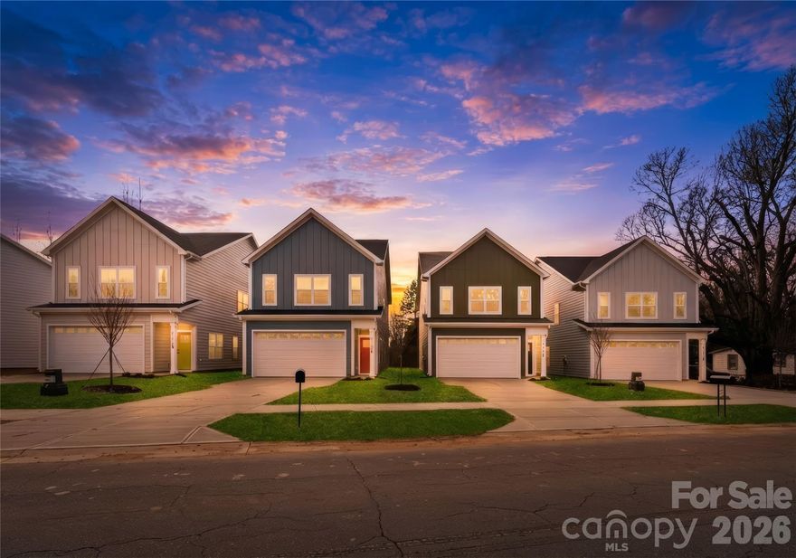 If you’ve been searching for new construction homes in Charlotte, NC that truly have it all, this is it. This exclusive five-home subdivision offers beautifully crafted, move-in ready homes in one of Charlotte’s most convenient locations. These new construction homes in Charlotte qualify for 100% financing and up to $10,000 in closing cost assistance, making them an incredible opportunity for first-time home buyers. Each home includes a full appliance package with refrigerator, washer, and dryer, along with fenced-in backyards perfect for your dogs. With no HOA, durable low-maintenance construction, and a home warranty included, you can move in with confidence from day one. Located just 15 minutes to Uptown Charlotte and South End, less than 10 minutes to Charlotte Douglas International Airport, and minutes from the U.S. National Whitewater Center, these homes offer quick access to Pine Island Country Club and are within 10–20 minutes of Mountain Island Lake, Lake Norman, and Lake Wylie—an unbeatable location for both commuting and recreation. Inside, you’ll find an open-concept floorplan with 9-foot ceilings on both levels, quartz countertops, white shaker cabinetry with 42-inch uppers, soft-close doors, designer tile backsplash, and luxury vinyl plank flooring throughout. Both the primary and secondary baths feature tile extended to the ceiling—an elevated detail rarely found at this price point. A dedicated main-level home office, two-car garage, rear patio, and flat fenced backyard complete these thoughtfully designed homes. If you’re looking for move-in ready homes in Charlotte with no HOA, modern finishes, financing incentives, and a prime location near Uptown and the airport, this is your opportunity. Come see the difference for yourself.
