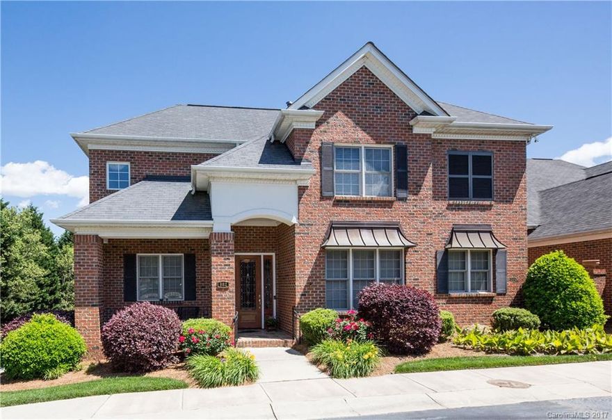 Custom Built 1.5 Story all Brick Home. Gorgeous Open Floor Plan w/Formal Dining, Office, Keeping Room & Great Room. Tiger Wood Hardwood Flooring Through Out on Majority of Main Living. Chef's Kitchen.  Master on Main w/Luxury Master Bath featuring a Walk In Shower, Whirlpool Tub & Dual Vanity.  Loft w/Wet Bar, Media Room, 2 Beds & 2 1/2 Baths up. Court Yard Patio Perfect for Privacy & Entertaining. Whole House Surround, Security & Central Vacuum.