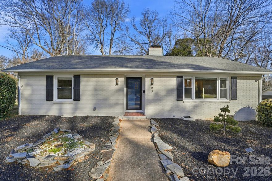 Move-in ready and beautifully updated, this full-brick 3-bedroom, 2-bath home is priced BELOW tax value and sits on one of the larger lots in the Echo Hills area with NO HOA! In a prime location, just a half mile from Vaulted Oak Brewery and Reids Fine Foods and 3 miles to Uptown. Inside, you’ll find real hardwood floors throughout, recessed lighting in the main living areas and two fireplaces. The renovated kitchen features granite countertops and appliances replaced in 2024, while both bathrooms have been updated. Major improvements include energy-efficient windows, architectural shingle roof, new HVAC ductwork, and a 2020 water heater. Enjoy exceptional outdoor living with a large, fenced backyard that backs up to woods, complete with a seating area for peaceful mornings or evenings. Entertain with ease on the large concrete patio with market lights and an integrated gas line for grilling. The powered sunroom with vented windows adds flexible year-round living space while the outside utility room provides added storage. Curtains, shed, refrigerator, outdoor table and chairs and market lights are all included with the sale of the home. This is a rare combination of updates, lot size, location, and NO HOA! Schedule your showing today!