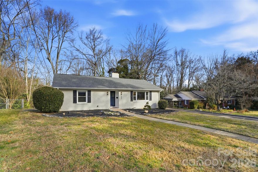 Back on market due to no fault of seller! Full-brick 3-bedroom, 2-bath home located in the Echo Hills area on a spacious lot with no HOA. This property offers convenient access to local dining and retail, including Vaulted Oak Brewing and Reid’s Fine Foods, and is approximately 3 miles from Uptown. Interior features include hardwood floors throughout the main living areas, recessed lighting, and two fireplaces. The kitchen has been updated with granite countertops and appliances replaced in 2024, and both bathrooms have also been updated. Additional improvements include energy-efficient windows, architectural shingle roof, new HVAC ductwork, and a water heater installed in 2020.

The large fenced backyard backs to a wooded area and includes a seating area and a concrete patio with market lights and an integrated gas line for grilling. A powered sunroom with vented windows provides additional flexible living space, and an exterior utility room offers added storage. Refrigerator, shed, curtains, outdoor table and chairs, and market lights convey with the sale. Schedule your showing today!