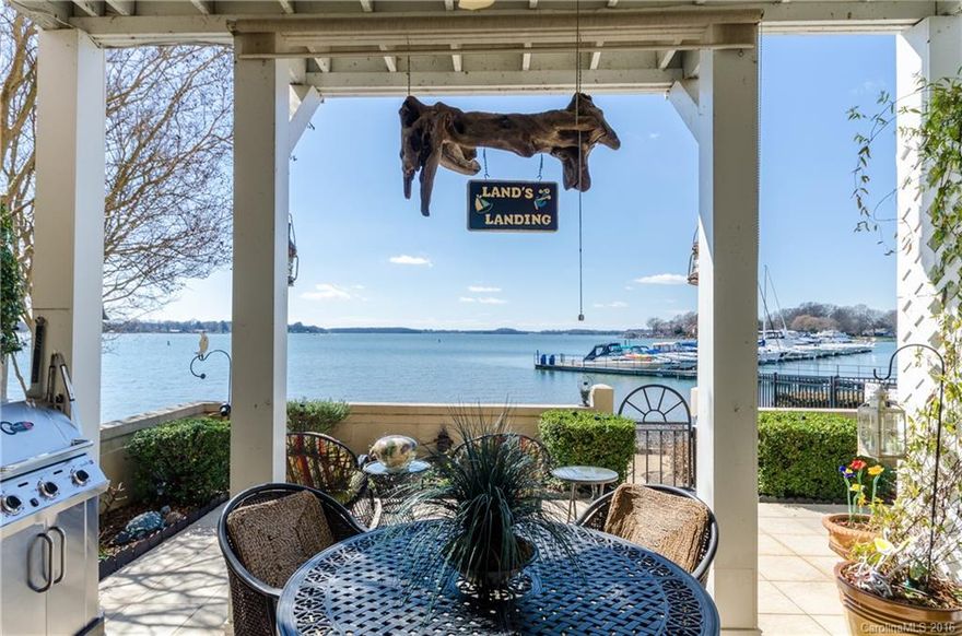 Spectacular GROUND FLOOR waterfront condominium with stunning views of Lake Norman. You will feel like you're on vacation year-round!  Move-in ready w/many upgrades.  Maple kitchen cabinets, granite counter tops, new SS appliances, Subzero Refrigerator, Bosch Gas Range, new hot water heater, double-pane windows have been replaced. Carpet is only 2 years old. Boat slips and dry storage seconds away. You will not find any condo closer to the lake & sunsets as breathtaking as this one! A MUST SEE!