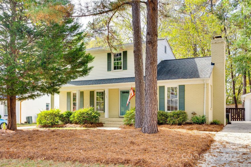 Updated and move-in ready Ballantyne beauty! Stunning site-finished hardwoods, wainscotting, neutral colors, updated fixtures and many more stylish updates. Living room with wall mounted TV AND great room with wood burning fireplace & vaulted ceiling w/ beams gives you plenty of room to spread out. The kitchen covers all of the bases with tons of cabinetry, granite, tile back splash, an island as well as SS appliances (dishwasher 2023, refrigerator 2021, induction range 2022). Bedroom/office has custom feature wall and the primary suite features 2 barn door closets. Enjoy the outdoors with a large yard w/ privacy fence, deck and patio. Two car detached garage is heated and cooled giving you many, many options for that space too. New HVAC 2023. No HOA, fabulous location and convenient to everything Ballantyne has to offer. Stop looking and start unpacking!