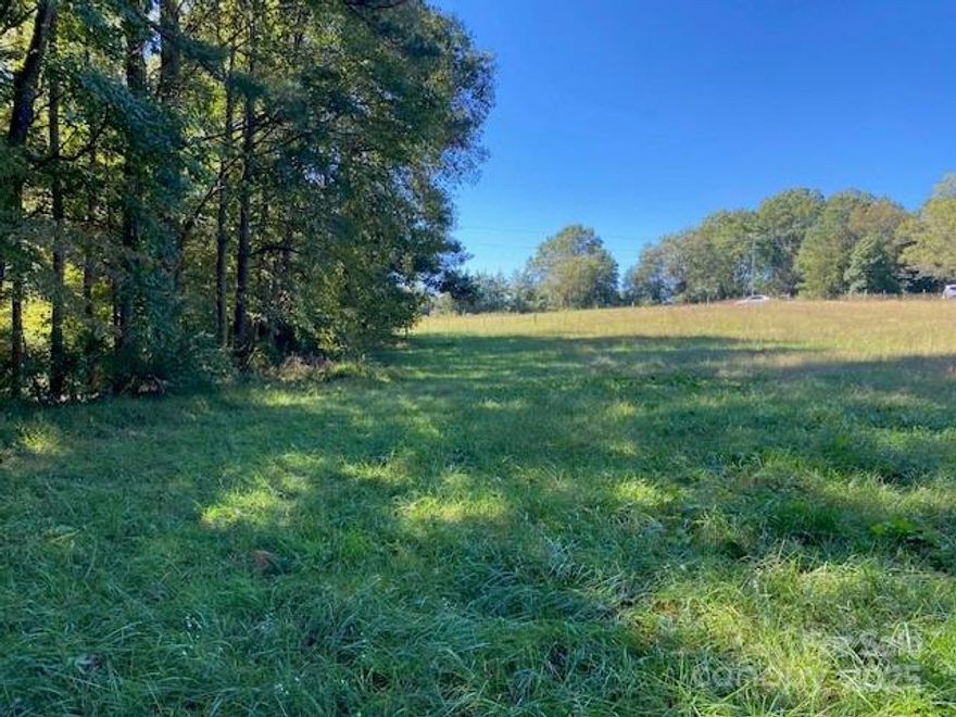 Here is your NO HOA building lot that is 5 acres. This is a combination of 2 parcel numbers. More land is available for sale.   This land is 1 mile from Hwy 274 in Lake Wylie. This property has County water available at the street or you could drill a well.  Buyer will be reasonable for getting your own perk test and new survey at your own cost.  York County to approve all new parcels.
County Zoning: RUD    Land is partially cleared but also wooded maybe 50%. Clover Schools.