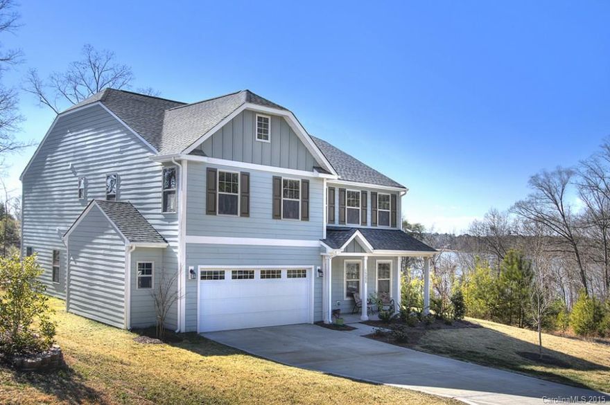 Breathtaking water views will make you want to call this nearly new home yours.  The large formal dining room, huge kitchen and open great room are excellent for entertaining.  The second floor has a sink rough in to add a second kitchen and the 14 by 18 second story deck ensures uninterrupted water views year round.  The property backs to common space which allows Lake access to launch a canoe or kayak and community amenities include a waterside pavilion, pool, tennis, golf, marina, dry storage