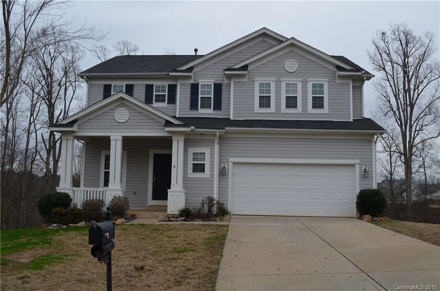 Come and get it!  Open floor plan, Granite in Kitchen, Wood floors and Stainless Steel Appliances.  Great layout with loft up.  Large Laundry on second floor.  Huge master with dual sinks and walk in closet.  Deck and Patio.  Cul-de-sac lot and private wooded backyard.  Great Fort Mill Neighborhood with Community Pool.  Basement is unfinished.  Sellers have priced to sell.