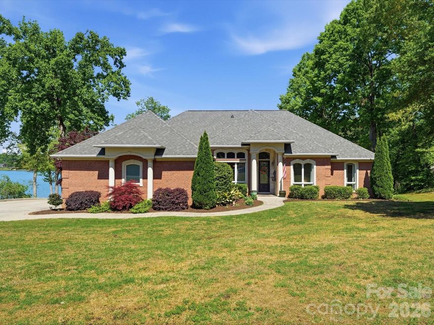 Stunning waterfront home on tranquil Moss Lake! With 132' of deep water lake frontage and a two tier dock with boat lift, this home offers lake life at its finest. The large kitchen with stainless appliances, granite countertops, eat-in bar, and custom cabinets opens up to the breakfast nook, spacious living room, and newly added (April 2026) sunroom, all overlooking the water. The owner's suite has a private walkout deck, and the custom owner suite bathroom features his-and-hers vanities, a large jacuzzi tub, walk-in shower, and oversized walk-in closet. Two-car main-level garage has a 50-amp service ready for your electric car. Downstairs boasts a second full kitchen and laundry, living area, breakfast area, and three full rooms perfect for a second office, home gym, theater room, or guest rooms. The basement level also features an additional garage with 30-amp service, workshop space, and an expansive covered patio area, perfect for hosting. Recent major systems upgrades include: HVAC (both units 2023), roof (2025), water heaters (electric in 2024; gas in 2023), and sunroom windows (2026). The back of the home facing west-northwest, the views of the sunset over the water are nothing short of breathtaking. From the thoughtful finishes, flexible spaces, and outdoor oases, this home is an entertainer's dream and a lake lover's paradise.