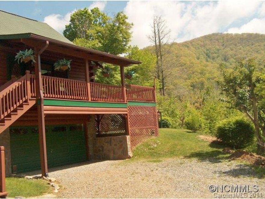 A Mountain log home that has it all! Year round view, rushing stream, large covered and open deck with hot tub.Your own wildlife sanctuary. A complete furnished package. Inviting great room decorated with High Country furniture and rich taste/colors throughout. A must see in Maggie Valley, close to Cataloochee Skiing, Harrah's Casino, Hiking, Blue Ridge Parkway.