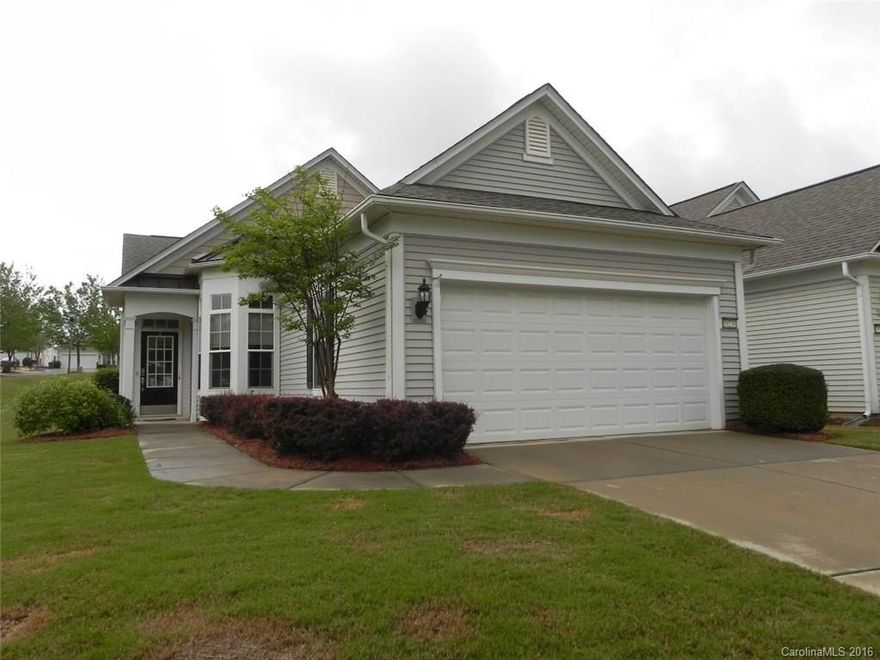 This 2BR/2BA home features an office or 3rd BR and a sunroom.  The interior has corian counters, stainless appliances, new laminate flooring,  upgraded lighting and fans.  The backyard is fenced and the expanded patio has 2 electric awnings.  It sits on a large, flat corner lot with irrigation.   Come check out this home and the active adult lifestyle of Sun City Carolina Lakes.