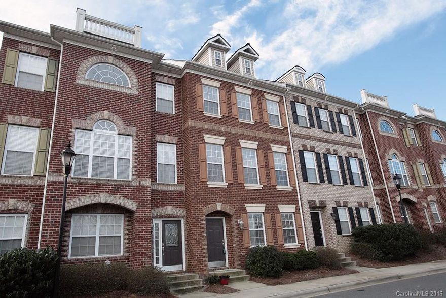 Live!  Work!  Play!  This gorgeous, model-like, full brick town home is perfectly positioned overlooking uptown Charlotte and just minutes from Charlotte International Douglas Airport.  Complete with custom interior paint, fresh carpets, custom closets, hardwoods throughout main level, ceramic tile and attached 2-car garage.
