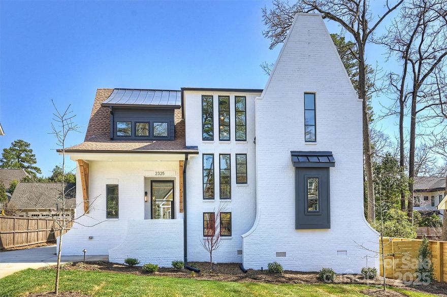 Modern Elegance in the Heart of Dilworth: Thoughtfully designed and impeccably crafted, this 5-bed, 4.5-bath home is a true showstopper. Highlights include vaulted ceilings in the primary suite and 2nd floor bonus room, walk-in closets with custom built-ins, scullery, drop-zone with cubbies, and a striking open-riser staircase. A custom steel and glass front door sets the tone for the sophistication within.
At the heart of the home, the open-concept main floor is designed for effortless indoor-outdoor living. The kitchen flows seamlessly into the dining and living areas, while the living room connects to a private courtyard— anchored by two walls of accordion-style sliding glass doors. These operable glass walls create the perfect transition between the living room, courtyard, and a stunning four-season room, extending all the way to the backyard for a truly immersive living experience.
A rare blend of architectural excellence and everyday luxury—this home is a standout.