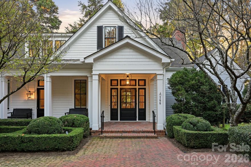 Experience Lake Norman living at its finest in this custom waterfront retreat on a private, gated peninsula. Designed by Don Duffy Architecture and built by renowned custom home builder Philip R. Thomas, this home blends timeless architecture, refined craftsmanship, and relaxed luxury. The open main level features heart-of-pine floors, expansive lake views, and seamless indoor-outdoor flow for effortless entertaining. A gourmet kitchen, inviting great room with stone fireplace, and lakeside screened porch set the stage for everyday living and memorable gatherings. Three main-level bedroom suites, including the serene primary retreat, offer comfort and privacy. Upstairs, a spacious bedroom suite and flex spaces provide room for guests or recreation. Outdoor living shines with over 300 feet of shoreline, double dock with boat lift, outdoor shower, and sweeping main channel views. Set on a private one-acre lot at the tip of Iron Gate, this property offers tranquility, sophistication, and the ultimate Lake Norman lifestyle—just across the water from Davidson College’s Lake Campus, minutes to Mooresville conveniences, and an easy drive to Charlotte.