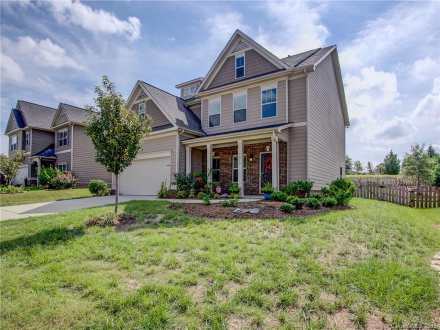 Absolutely Gorgeous Craftsman w/RARE GUEST BEDROOM & FULL BATH ON MAIN!! Sunny Open Floor Plan w/2 Story Foyer, Gracious Dining Room with Trey, Crown & Picture Moldings Accented by Arched Casements. Gourmet Kitchen w/42" Cabinets, Granite, Tile Backsplash, Incredible Cabinet & Counter Space, Pantry + HUGE Center Island w/Room for 6 Open to Breakfast & Great Room w/Corner Gas FP! HW's in Foyer, Great Room, Kitchen & Breakfast! Lux Master w/Spa Bath + INCREDIBLE Walk-in! BIG Secondary BR's + Loft!