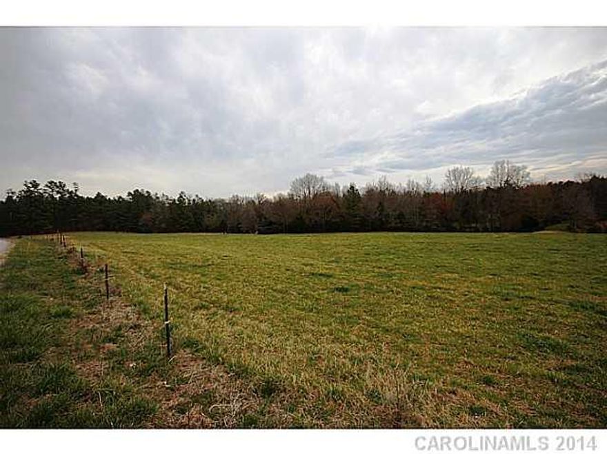 Approximately 25 acres divided from a beautiful 130 acre farm that was handed down from generation to generation.  Your chance to own a piece of history. This tract is mostly open with pasture land and wooded on back.  Located only 6 miles from Lake Wylie shopping. No HOA. No HOA fees. Horses welcome.  Build when you want with who you want or choose one of our builders.  Great Clover Schools.