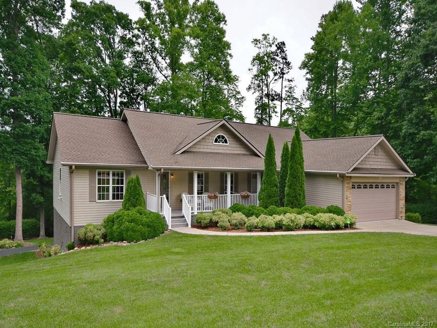 Two homes in one, beautifully finished, move in ready. Main level has 3 beds, 2 baths, gleaming Patagonia Rosewood floors, quartz counters, enclosed sunporch surrounded by trees.  Lower level is fully equipped apartment. all hardwood floors, full kitchen, master suite, screened porch, private entrance and game room.