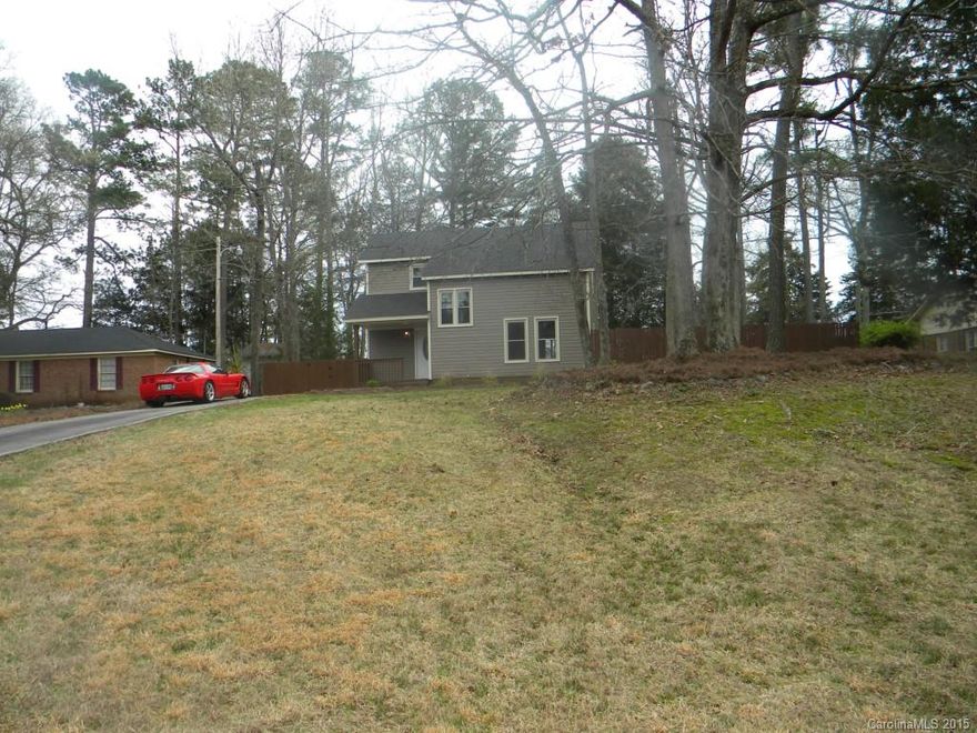 NEW, NEW, NEW, carpet, freshly painted, laminate wooden floors, new plumbing fixtures, new light fixtures, new landscaping. Kitchen includes stainless appliances and white cabinets. Family room with built-ins. Dining area with sliding doors to large back patio. Wonderful fenced in yard.  Don't miss this one! A true value!