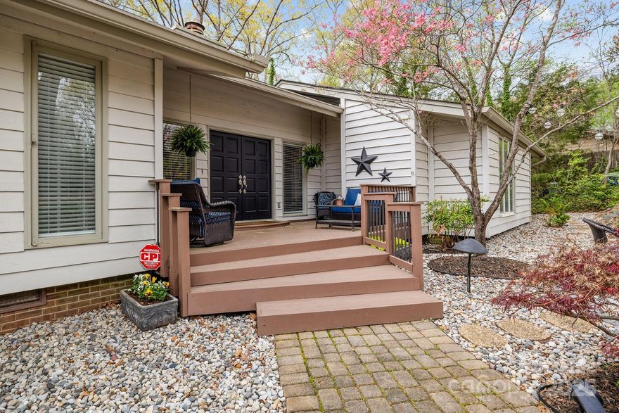 Welcome to this beautifully updated 4-bedroom, 3-bathroom home in the sought-after River Hills neighborhood. Surrounded by mature trees, this home offers privacy and incredible outdoor living with multiple decks and a screened-in porch overlooking serene wooded views. Inside, enjoy all-new wood floors, fresh carpet, and a stunning wood-burning stone fireplace. The walk-out basement features a large bedroom and full bath, perfect for guests or extra living space. The fully renovated master bath adds a touch of luxury, while the new cozy front stone porch enhances curb appeal.

River Hills offers 24-hour security, walking trails, a community beach, and a marina. Optional Country Club Membership provides access to a golf course, tennis, pickleball, a pool, restaurant, and gym. With award-winning schools and low SC taxes, this home is a must-see! Schedule your showing today!