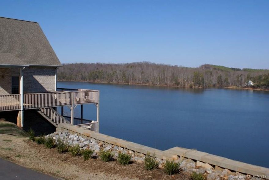 Lakefront living with this fabulous 3 Br/ 3 Ba custom-built home. Finding the perfect house is like falling in love-you just know it when it happens. Buyers often describe the experience when they say, "It felt like the right home the moment we stepped through the front door". This home has all of the potential for that effect located in a tranquil setting on Lake Lookout. Grand Lakeviews from inside The Great Room or outside on The Massive Deck of This Brick Waterfront Home. 20X28 Aluminum Dock