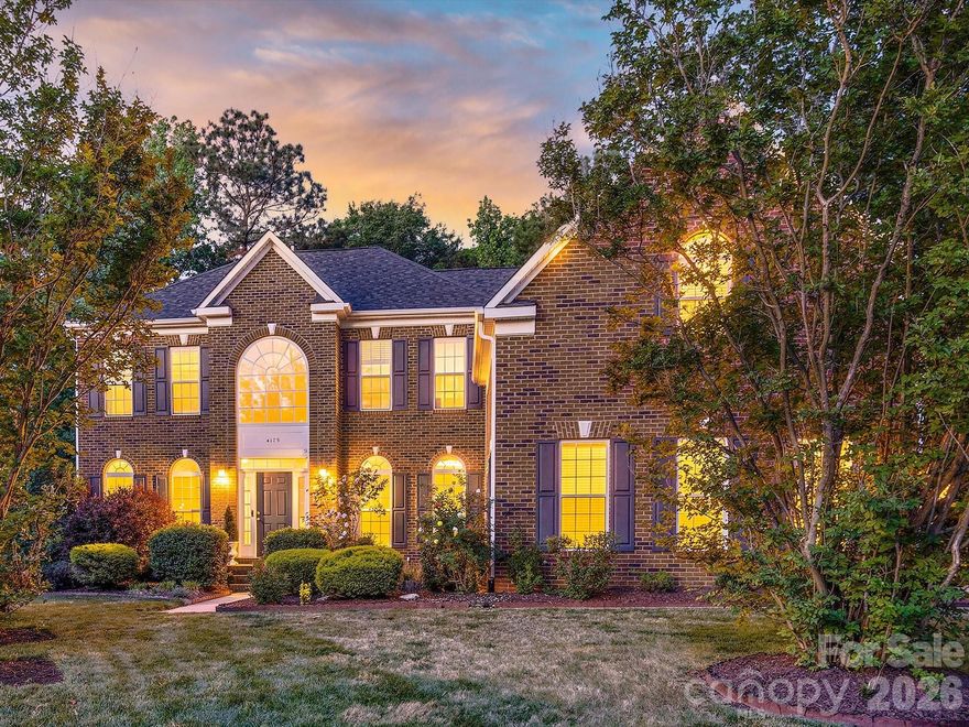 Beautifully maintained home perfectly located in a quiet cul-de-sac with 3 car, side load garage, features a spacious and functional layout with hardwood floors, abundant natural light, and elegant details throughout minutes from Charlotte! The open-concept kitchen offering granite counters, plenty of 42" cabinetry & spacious island & walk in pantry flows seamlessly into a bright, large breakfast nook and living areas, while a sunroom, formal dining room and inviting entry with flowing staircase add charm and versatility. The oversized primary suite on the upper level offers a tray ceiling, sitting area potential, recently remodeled spa-like bath with dual vanities, garden tub, separate shower, and a large walk-in closet, complemented by generously sized secondary bedrooms and additional full bath. Enjoy everyday convenience with a dedicated laundry room conveniently located on the main level, ample storage and a spacious upper-level landing. Step outside to a private back deck overlooking a serene, wooded backyard—perfect for relaxing or entertaining—while the community enhances your lifestyle with a clubhouse, resort-style pool, and scenic walking trails. This home is well located close to Ballantyne with plenty of shopping, restaurants & entertainment. Low Lancaster County taxes!