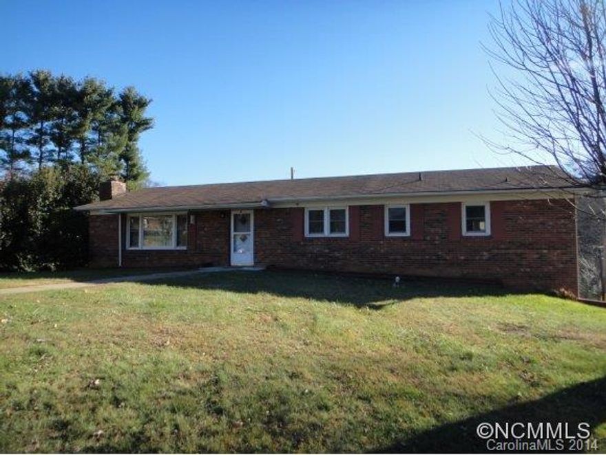 OWNER IS MOTIVATED AND WANTS AN OFFER!This classic brick rancher is waiting on you.The living room has a wood burning fp and is open to the kitchen/dining area.Dining Area has built in cabinets and access to the Deck.Deck has a Awning for your Convenience. Replacement Windows. Central AC. Ceiling Fans.Spacious 32x10 Family Room with a Wood Burning Stove.Park at least 2 cars back to back in the garage and still have room for plenty of storage.