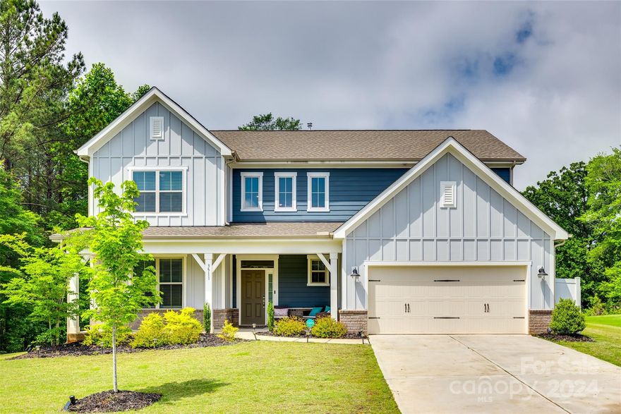 Welcome Home! This stunning 4-bedroom, 3-bathroom home has everything you've been searching for. Inside and out, there's ample space and a great layout awaiting you.

The open floor plan, anchored by a spacious living area, features a kitchen designed for entertaining, complete with a large island, gas stove, and walk-in pantry. Convenience meets hospitality with a guest bedroom and full bathroom on the main level, while upstairs, a versatile loft and a spacious primary suite await.

Enjoy the inviting curb appeal of the charming front porch, then retreat to the fenced backyard, offering a serene wooded view and patio.

Nestled on one of the most coveted lots in the neighborhood, this stunning home, built in 2021, truly has it all. Plus, its convenient location ensures easy access to shopping and dining options. Don't let this opportunity slip away—make this home yours today!