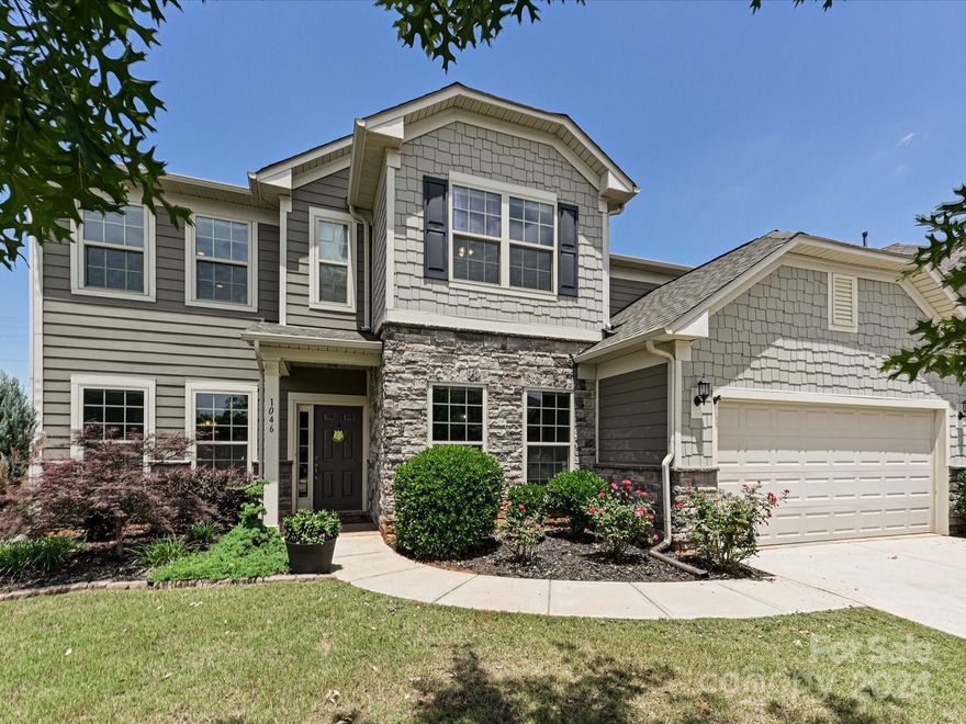 Welcome to this charming home nestled in the heart of Indian Land SC just moments away from the vibrant amenities of Ballantyne. Vinyl plank flooring graces the expansive living areas, creating a seamless flow throughout the home's open floorplan. Entertain guests in the dining room, adorned with a trey ceiling and accented by crown and picture frame moldings. A home office awaits, complete with glass French doors for added privacy. The gourmet kitchen features granite countertops, ample cabinetry, and stainless steel Kitchen Aid appliances. An adjacent home organization area, currently utilized as a bar space, adds convenience and functionality to the heart of the home. A screened-in porch overlooking the level, fenced backyard—a perfect setting for outdoor dining, morning coffee, or simply unwinding after a long day. Upstairs, you will find three additional bedrooms & two full bathrooms and a spacious loft area. Conveniently located near shopping & dining and easy access to 521.