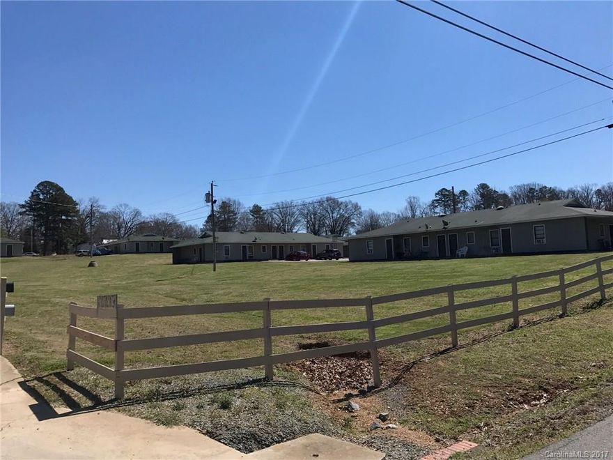 Apartment Complex: 4 duplex units, 14 multi unit buildings, 1 office and community laundry building, situated on 7.14 acres in Albemarle. 48 - Two Bedroom Units and 32 - One Bedroom Units.