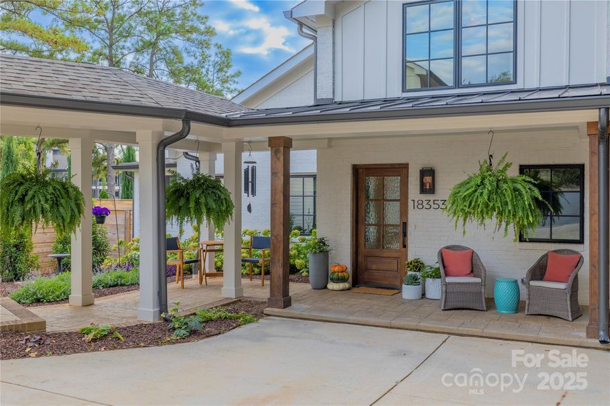 Nestled along the serene waterfront, just outside the peninsula, this stunning, completely renovated 3,300-square-foot home offers the ultimate blend of luxury, convenience, and lake charm. Rebuilt down to the studs, this architectural masterpiece exudes modern elegance and timeless appeal, perfect for those seeking a peaceful escape or a versatile lakeside sanctuary.

Step inside to an amazing chef's kitchen, a culinary haven featuring sleek custom cabinetry, premium WOLF and Sub-Zero appliances, a large center island with quartz countertops, and a walk-in pantry—perfect for hosting lavish gatherings or intimate dinners. The open-concept living spaces, bathed in natural light  seamlessly connect to the outdoors, while the primary suite on the main level offers a serene retreat. Unwind in the spa-like ensuite with heated floors, a rainfall shower, and dual vanities, complemented by a spacious walk-in closet with custom built-ins.

Outside, your private oasis awaits: a covered porch with fireplace and an electric retractable screen creates a year-round outdoor haven, ideal for al fresco dining or relaxing by the water’s edge. The private dock provides direct access for boating, fishing, or sunset cruises, with breathtaking lake views at every turn. The property is enveloped by extensive landscaping, featuring manicured gardens, mature trees, and a fenced yard for privacy and a safe space for pets or play. 
Elevate your lifestyle with the studio apartment above the conditioned garage, complete with a full kitchen, bathroom, and laundry—perfect for guests or a private home office to complement your lakeside dreams. The climate-controlled garage offers versatile storage or workspace.