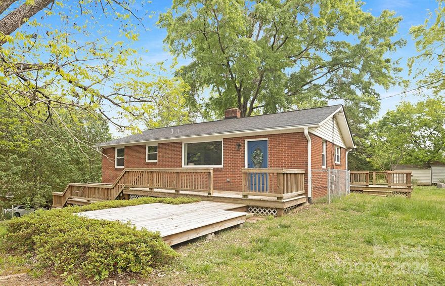 Discover a remarkable home with abundant flex space, indoors and outdoors, meticulously updated to perfection. Nestled on an oversized lot, this property offers unparalleled versatility and comfort. Conveniently located near essential amenities including hospitals, schools, and Interstate-85, it provides seamless access to Concord's vibrant developments. The upgrades throughout ensure both aesthetic charm and practical functionality, with sturdy decking enveloping most of the exterior and ample parking available. A basement adds to the home's versatility, and will need updates. A brand-new HVAC system guarantees enhanced comfort and energy efficiency. Don't miss the opportunity for this home! Sold as-is. CASH ONLY