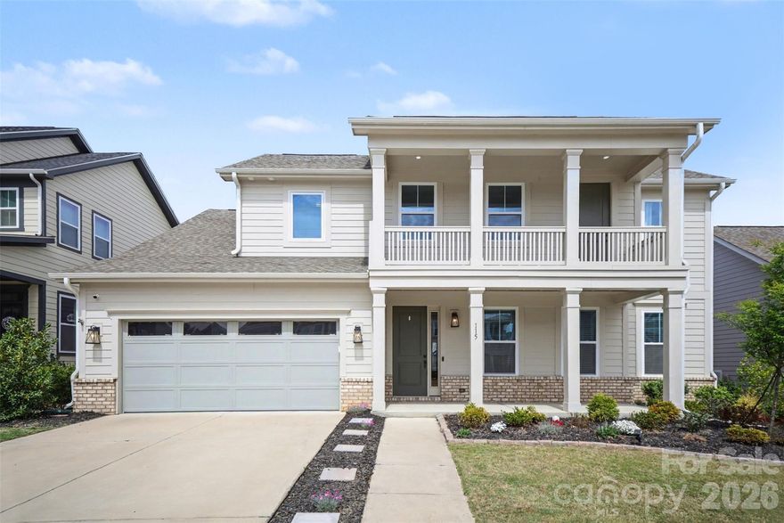 Welcome to this beautifully upgraded 4-bedroom, 3.5-bath home in the highly sought-after Paddler’s Cove community, located in the award-winning Clover School District. This move-in-ready home features hardwood and tile flooring throughout—no carpet anywhere.

Just off the entry, a sunlit flex space offers the perfect spot for a home office, reading nook, or additional sitting area. The kitchen is a standout, featuring upgraded stainless steel appliances, a large island with abundant cabinet storage, a walk-in pantry, and an open layout ideal for entertaining. The spacious dining area easily accommodates a large table and sideboard, making it perfect for gatherings.

The inviting living area showcases custom built-in cabinetry and shelving, a sleek linear fireplace, and prefinished hardwood flooring with a convenient floor outlet. The main-level primary suite features a tray ceiling, recessed lighting, and a fully customized walk-in closet. The en-suite bath includes an extended raised dual vanity, tile flooring, a soaking tub, and a beautifully tiled walk-in shower.

Upstairs, you’ll find a loft with a moody, speakeasy-inspired vibe—perfect for relaxing or entertaining—with direct access to the upper porch, ideal for morning coffee or evening cocktails. Three additional bedrooms and two full baths complete the upper level, all with hardwood flooring—still no carpet.

The main-level laundry room is thoughtfully updated with upper and lower cabinetry, tile flooring, and a utility sink. A convenient drop zone near the garage entry and a half bath add everyday functionality.

Outdoor living is just as impressive, with upper and lower front porches and an extended covered rear patio featuring a fireplace, ceiling fan, and low-maintenance epoxy flooring. The fully fenced backyard and refreshed landscaping complete the home’s curb appeal.

Enjoy all that Paddler’s Cove has to offer, including a clubhouse, pool, pickleball courts, playground, and soccer/ball fields—all just minutes from shopping, dining, and everyday conveniences.