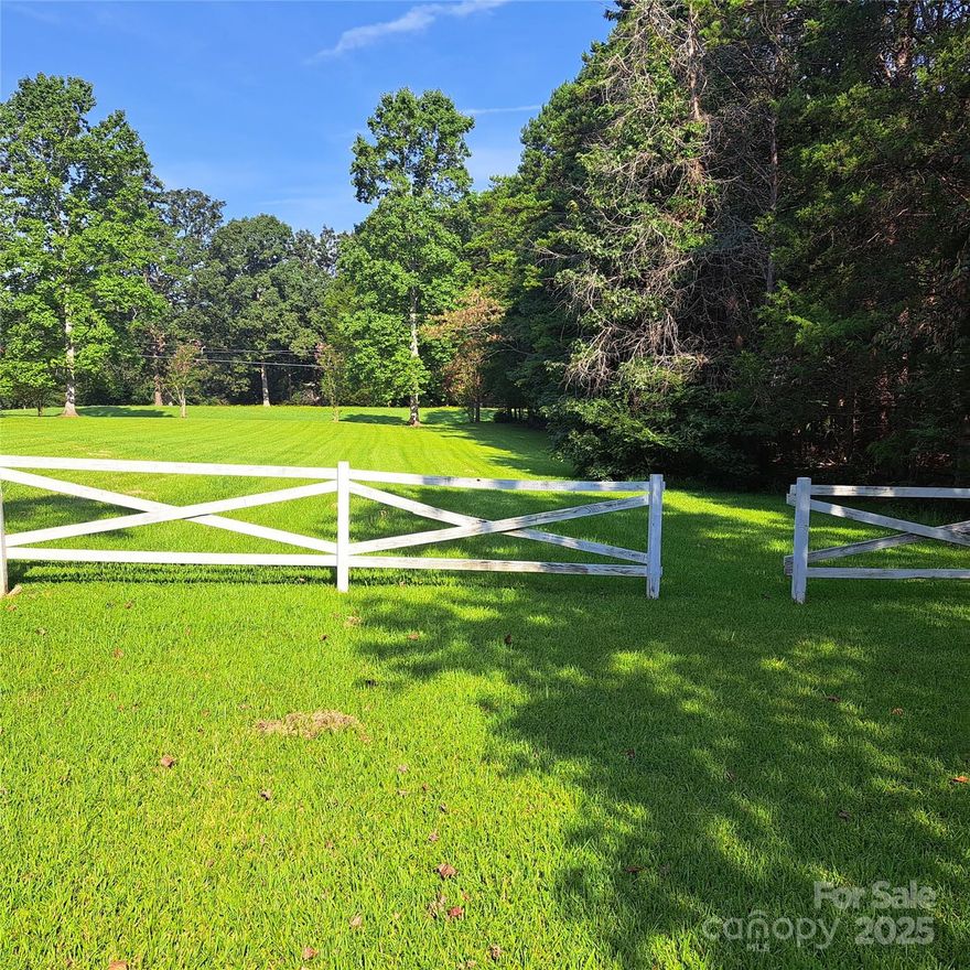 Over 15 acres of beautiful open land and hardwoods to build your dream home. There are two parcels of land on the property, one with parcel number 111-271-02 which has the house in it, and the other one with parcel number 111-271-07 which includes a big lot—the beautiful brick home with three bedrooms two bathrooms, and a sizable front and backyard. The house also features a large living room and two cozy fireplaces and it is in good condition, currently generating a good rental income of $1950. This property has a detached garage and it is convenient for shopping, hospital,s, and restaurants. Come see this one quickly before it is gone. Two parcels of land are included in the total acreage. Value is on the land.