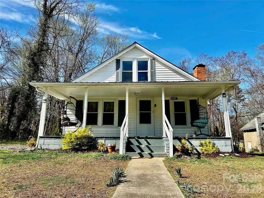 Charming home with a large covered front porch perfect for sipping lemonade and enjoying nature. Outside Lenoir but close to all city amenities. Energy efficient Mini Split units for heat/cooling. Newer dishwasher. Two bedrooms and full bath on main with another bedroom and a bonus room on the upper level. Note walls on upper level have eave storage. Fireplace has been sealed and is no longer in use.